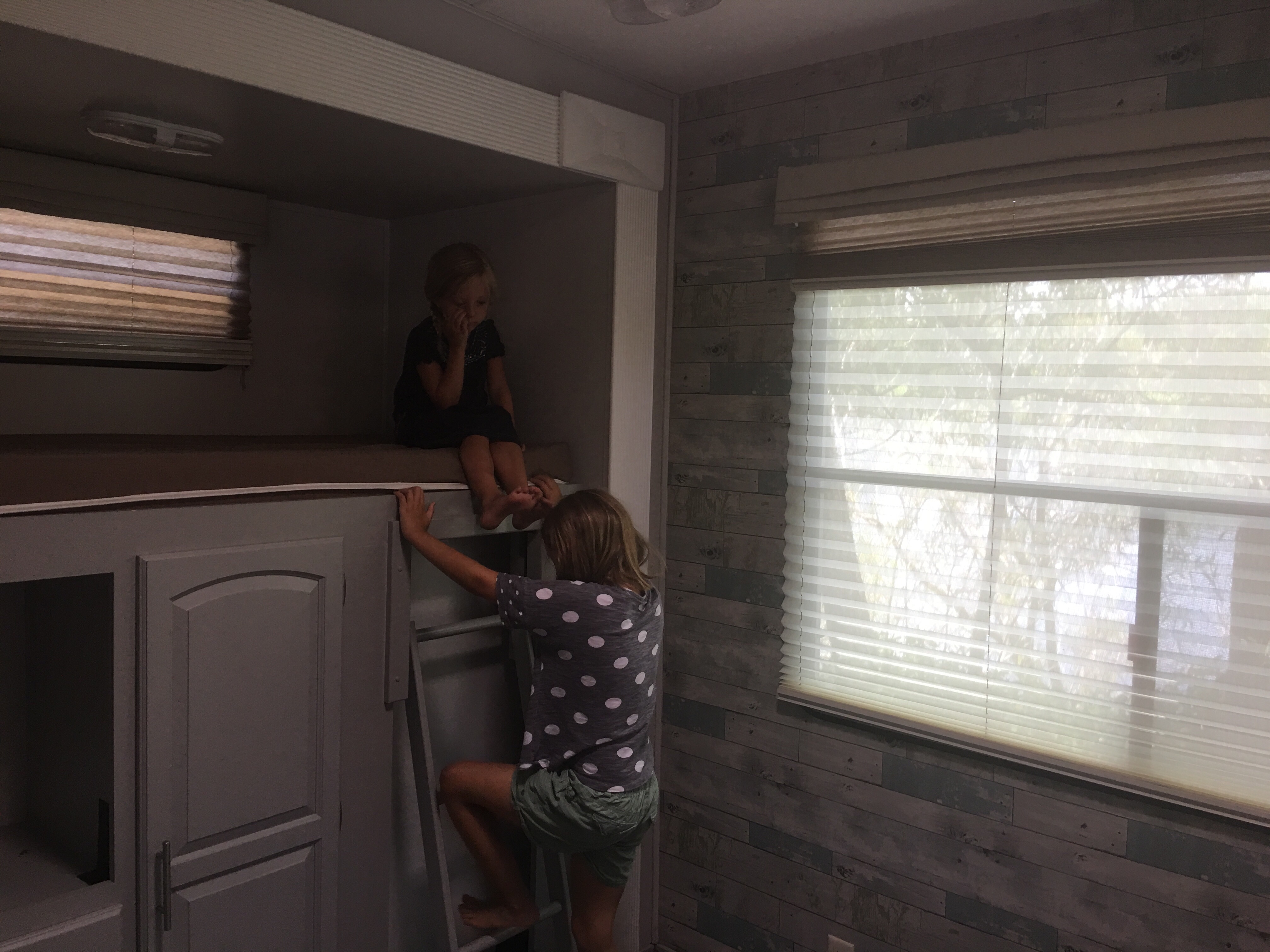 The girls checking out an RV bunk room